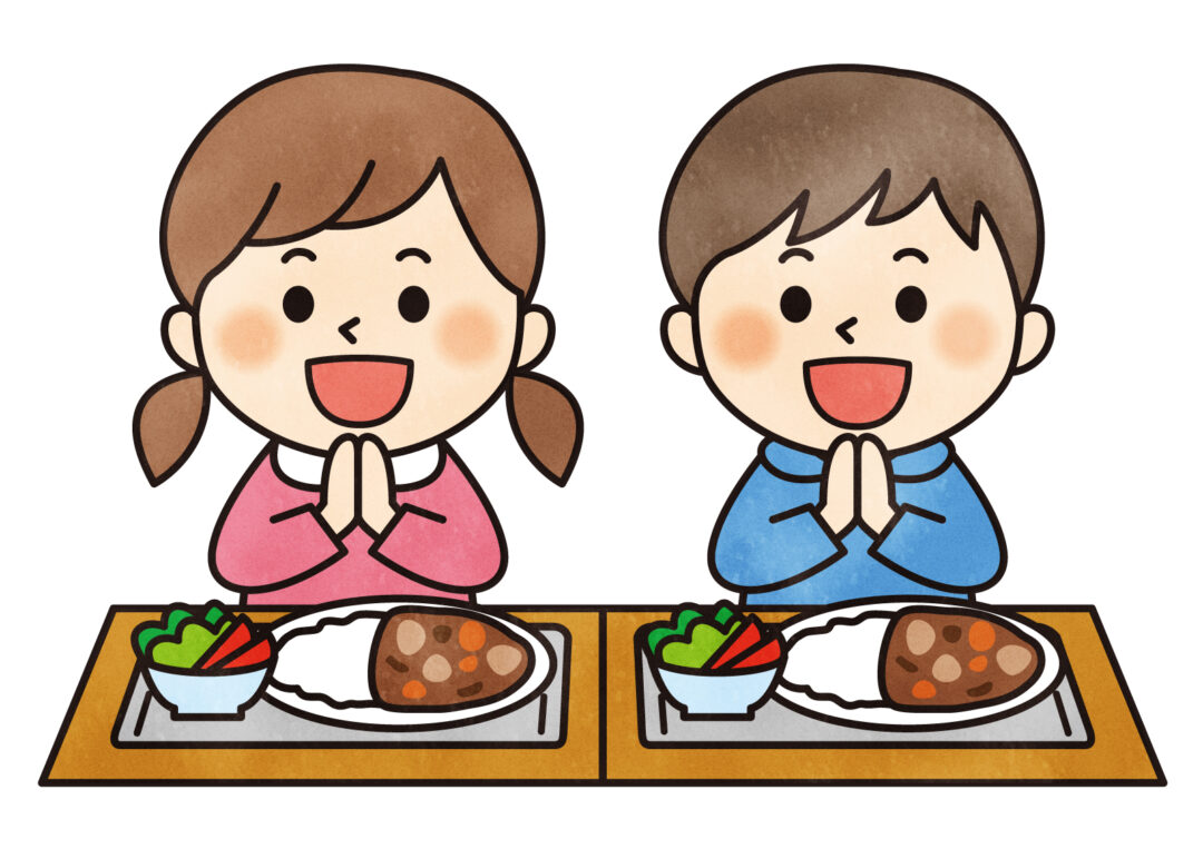 給食を食べる小学生のイメージ